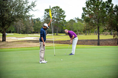 men playing golf