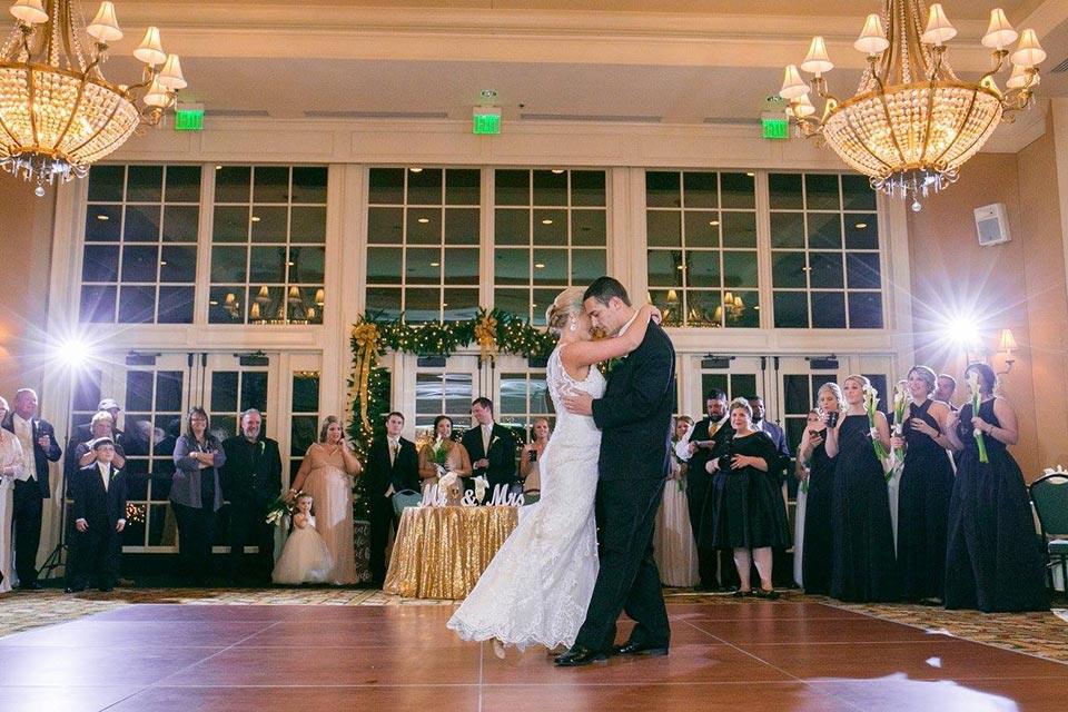 Photo of bride and groom dancing at wedding reception