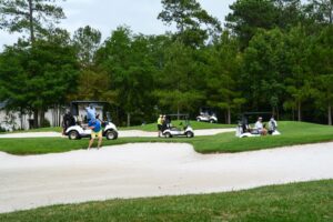 Photo of people playing golf at River Landing