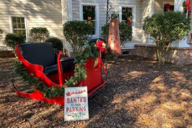 Photo of Santa's sleigh in front of house