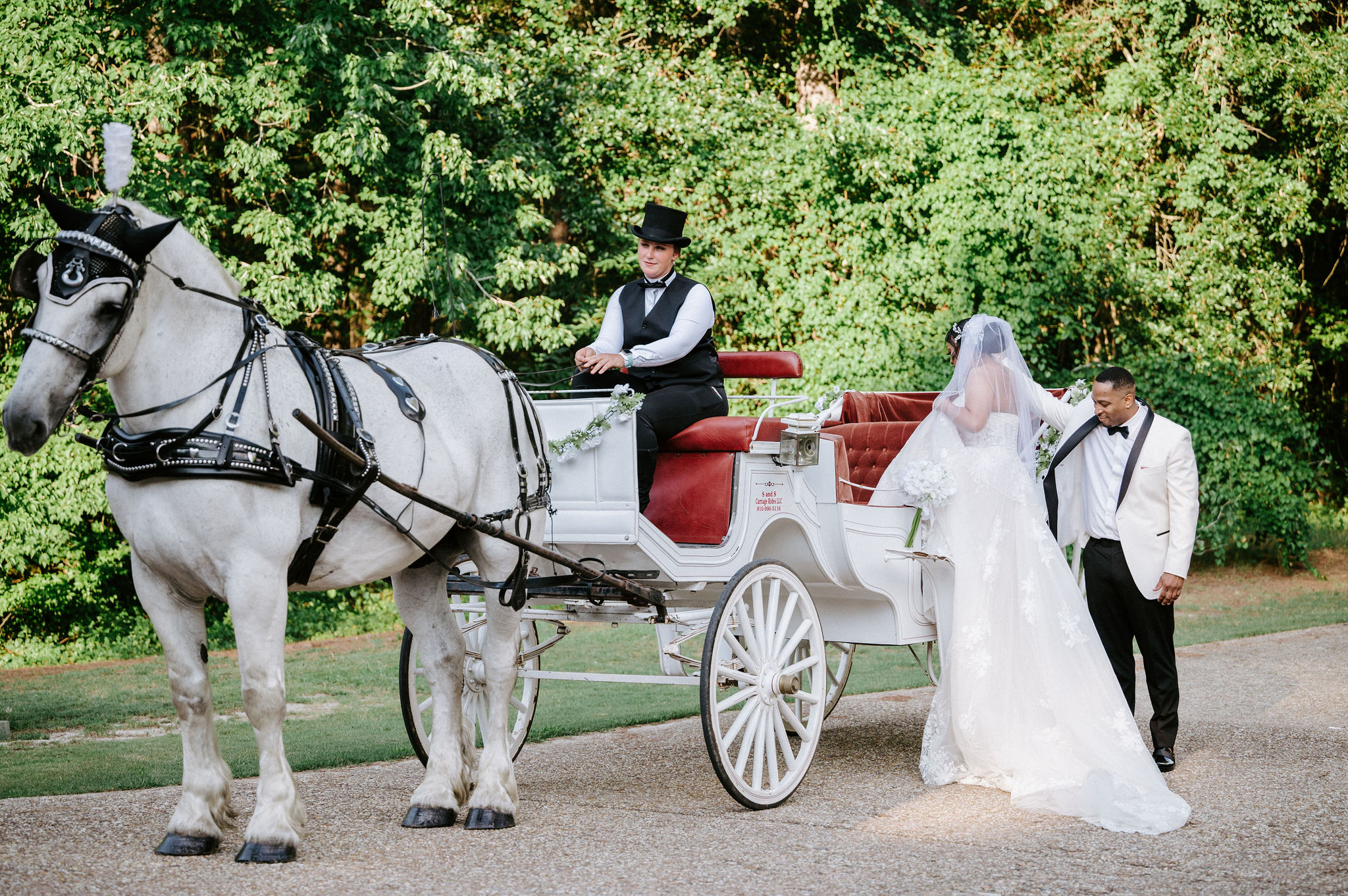 couple stepping into horse and carriage