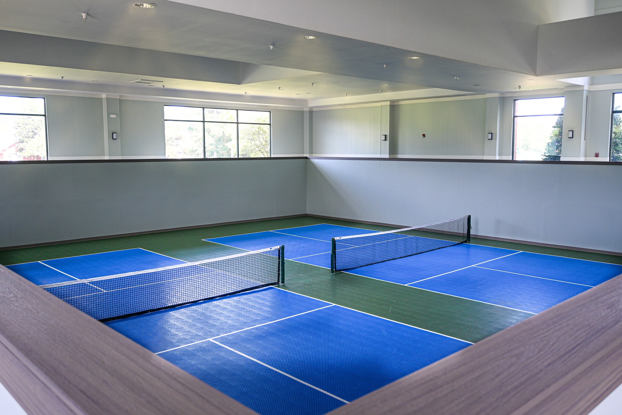 2 Indoor blue pickleball courts