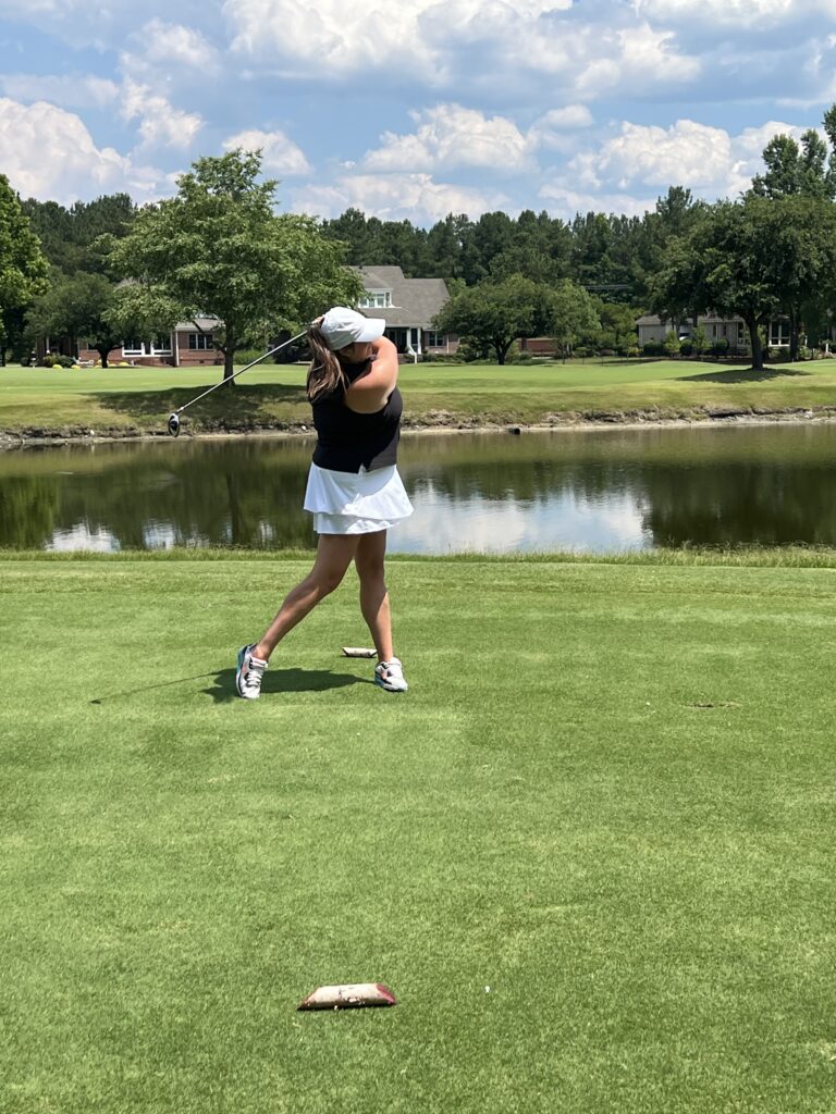 Woman Playing Golf